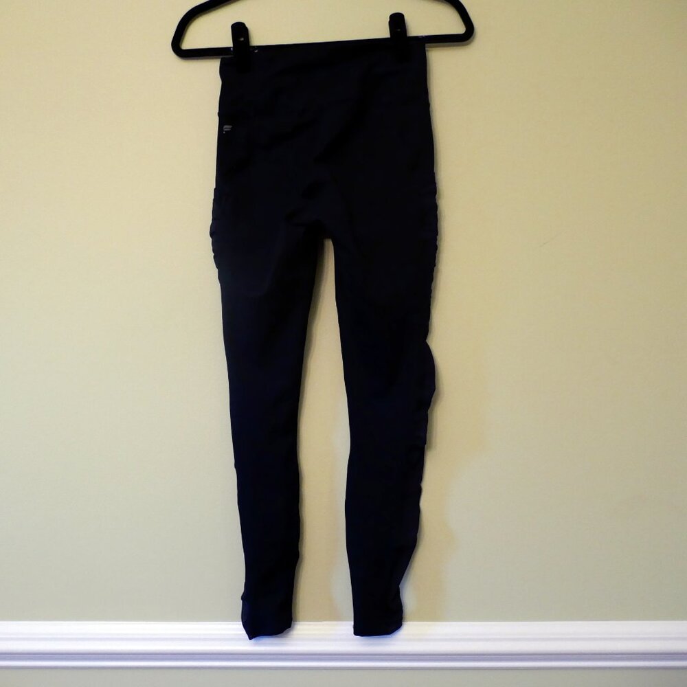 High-Waisted PowerHold® made by Fabletics black Legging with mesh cutouts